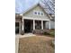 Charming brick home with a covered front porch and well-maintained landscaping at 3030 Appling Hills Dr, Dacula, GA 30019