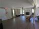 Bright living room showcasing wood laminate floors, white brick fireplace, and natural light at 3941 Covered Bridge Sw Rd, Smyrna, GA 30082