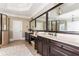 Elegant bathroom featuring dual vanities and a large mirror at 5175 Wilshire Xing, Cumming, GA 30040