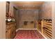 This wine cellar features lots of room for wine racks, wood panel ceiling, and plenty of space to find your vintage at 5175 Wilshire Xing, Cumming, GA 30040