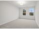 Bedroom with plush carpet and lots of natural light at 1068 Rose Dr, Marietta, GA 30060