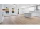 Open-concept living area with modern fireplace and lots of natural light at 1068 Rose Dr, Marietta, GA 30060