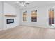 Cozy living room with electric fireplace, wood mantel, and hardwood floors at 1068 Rose Dr, Marietta, GA 30060