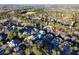 Expansive aerial view of homes nestled amongst dense trees in an established neighborhood at 2679 Wynnton Dr, Duluth, GA 30097
