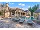 Sprawling backyard featuring a pool, hot tub, covered patio, and plenty of lounge seating for relaxation at 2679 Wynnton Dr, Duluth, GA 30097