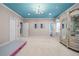 Bonus room with a distinctive ceiling, playroom area, and built-in storage at 2679 Wynnton Dr, Duluth, GA 30097