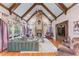 Open living room with vaulted ceilings, stone fireplace, hardwood floors and large windows at 2679 Wynnton Dr, Duluth, GA 30097