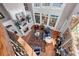 Expansive living room featuring a fireplace, large windows, and hardwood floors at 2679 Wynnton Dr, Duluth, GA 30097