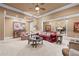 Comfortable sitting room with refined decor, including a plush sofa, accent chairs, and an ornate center table at 2679 Wynnton Dr, Duluth, GA 30097