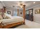 Luxurious main bedroom suite with four poster bed and detailed trim at 2679 Wynnton Dr, Duluth, GA 30097