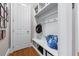 Well-organized mudroom with built-in storage, hooks, and bench seating at 2679 Wynnton Dr, Duluth, GA 30097