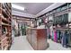 Expansive walk-in closet with custom shelving and center island storage at 2679 Wynnton Dr, Duluth, GA 30097