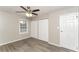 Neutral bedroom featuring fresh floors and two closets at 3390 Navaho Se Trl, Smyrna, GA 30080