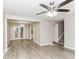 Inviting living space with modern floors and seamless transition to a dining area at 3390 Navaho Se Trl, Smyrna, GA 30080