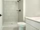 Clean, bright bathroom featuring tiled shower, white toilet, and modern sink, providing a functional and stylish space at 1514 Gatekeeper Ter, Marietta, GA 30066