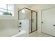 Modern bathroom with glass shower and tub at 1514 Gatekeeper Ter, Marietta, GA 30066