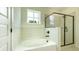 Modern bathroom featuring a tub and separate glass door shower at 1514 Gatekeeper Ter, Marietta, GA 30066