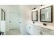 Bathroom showcasing double sink vanity and tiled shower at 1514 Gatekeeper Ter, Marietta, GA 30066