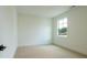 Neutral bedroom with window at 1514 Gatekeeper Ter, Marietta, GA 30066