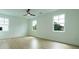 Bright bedroom with three windows and wood flooring at 1514 Gatekeeper Ter, Marietta, GA 30066