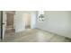 Bright bedroom with light wood floors, white walls, and windows that let in natural light, creating a serene and inviting space at 1514 Gatekeeper Ter, Marietta, GA 30066