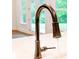 Modern bronze kitchen faucet at 6490 Mockingbird Rd, Cumming, GA 30028