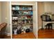 Spacious pantry with organized shelves providing plenty of storage in this home at 942 Heathchase Dr, Suwanee, GA 30024