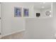 Bright hallway with neutral paint, leading to other rooms at 3121 Greyton Dr, Buford, GA 30519