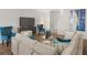 Comfortable living room with plush seating and a large TV at 3121 Greyton Dr, Buford, GA 30519
