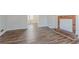 Comfortable living room with modern flooring and a charming brick fireplace at 5438 Zachary Dr, Stone Mountain, GA 30083