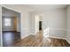 Bright room featuring modern flooring, neutral paint and white trim at 5438 Zachary Dr, Stone Mountain, GA 30083