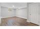 Finished basement space with neutral walls and wood-look flooring at 1551 Avon Ave, Atlanta, GA 30311