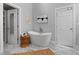 Elegant bathroom featuring a modern soaking tub and stylish decor at 1551 Avon Ave, Atlanta, GA 30311