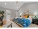 Cozy bedroom with hardwood floors, a ceiling fan, and soft lighting at 1551 Avon Ave, Atlanta, GA 30311