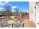 A wooden deck offers outdoor space for relaxing or dining at 3760 Lake Point Blvd, Suwanee, GA 30024