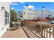 View of the deck with a table and chairs overlooking the townhouse community at 3760 Lake Point Blvd, Suwanee, GA 30024