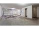 Spacious garage with concrete floor and white walls provides ample space for parking and storage at 3760 Lake Point Blvd, Suwanee, GA 30024