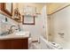 Bathroom featuring a vanity, a shower-tub combo, and neutral tones at 3806 Lindley Cir, Powder Springs, GA 30127