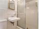 Bright bathroom with a stand up shower and white tile at 3806 Lindley Cir, Powder Springs, GA 30127