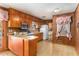 Kitchen features wood cabinets and kitchenette at 3806 Lindley Cir, Powder Springs, GA 30127