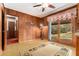 Wood paneled kitchenette with a door leading to the backyard at 3806 Lindley Cir, Powder Springs, GA 30127