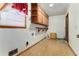 The laundry room features built-in cabinets and neutral tones at 3806 Lindley Cir, Powder Springs, GA 30127