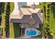 Aerial view showcases lush landscaping, a private pool with sun loungers, and an expansive lawn at 4434 Oglethorpe Nw Loop, Acworth, GA 30101