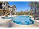Beautiful pool and outdoor lounge area with a view of the house's upper level deck and yard at 4434 Oglethorpe Nw Loop, Acworth, GA 30101