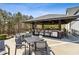 Outdoor bar area with seating offers a social gathering space for enjoying refreshments and outdoor dining at 4434 Oglethorpe Nw Loop, Acworth, GA 30101