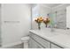Bright bathroom with quartz counters, gray vanity, and glass-enclosed shower at 4434 Oglethorpe Nw Loop, Acworth, GA 30101