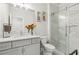 Bathroom featuring a gray vanity, quartz countertop, and glass enclosed shower at 4434 Oglethorpe Nw Loop, Acworth, GA 30101