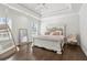 Bedroom with a swing chair and a king-size bed, with large windows providing natural light at 4434 Oglethorpe Nw Loop, Acworth, GA 30101