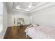 Spacious bedroom features a ceiling fan, a desk, and tray ceilings at 4434 Oglethorpe Nw Loop, Acworth, GA 30101