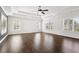 Large bedroom featuring hardwood floors, windows, and abundant natural light at 4434 Oglethorpe Nw Loop, Acworth, GA 30101